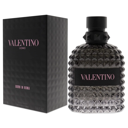 Valentino Uomo Born in Roma Eau de Toilette 100ml bottle with dark studded glass and black cap next to gift box